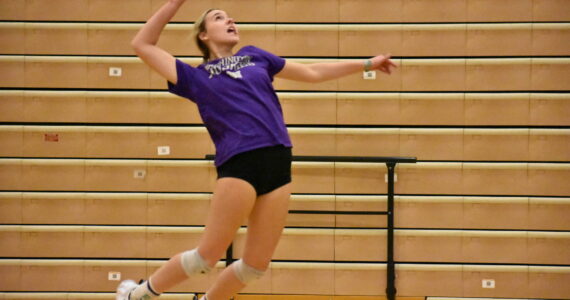 Rylee Booth goes up for a kill in practice before the Spartans matchup with Olympia. (Photos by Ben Ray / Sound Publishing)