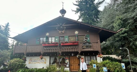 Bernard Garbusjuk stands outside of Boehm’s Candies, 255 NE Gilman Boulevard in Issaquah. (Photo by Cameron Sires/Sound Publishing)