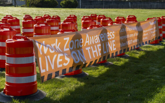 Sixty-one orange traffic barrels were set up April 2, 2024, on the WSDOT front lawn in Olympia. Each cone represents a fallen WSDOT employee killed on the job since 1950 - many in active work zones. The visual display is meant to remind everyone of the importance of slowing down in work zones. Photo courtesy of Washington State Department of Transportation.