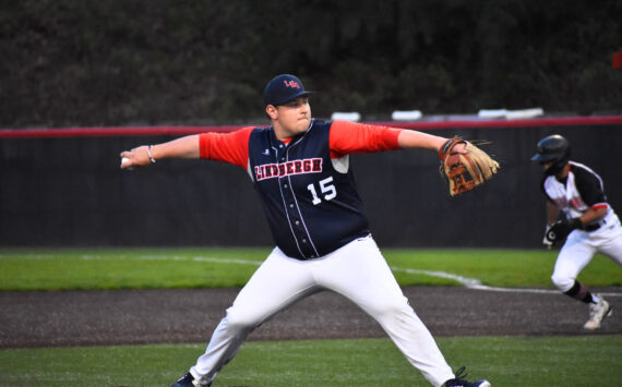 Kyle Burris takes to the mound against Sammamish at Bannerwood Park. Ben Ray / The Reporter