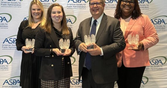 Wally Bobkiewicz stands in the front right position with three other National Public Service Award winners. (Photo courtesy of the city of Issaquah)