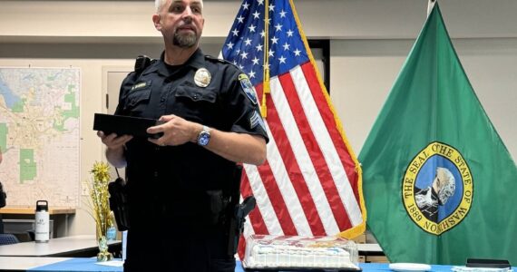 Sgt. Roger Enders and colleagues celebrate his last day on the job on May 31. (Photo courtesy of Issaquah Police Department Facebook)