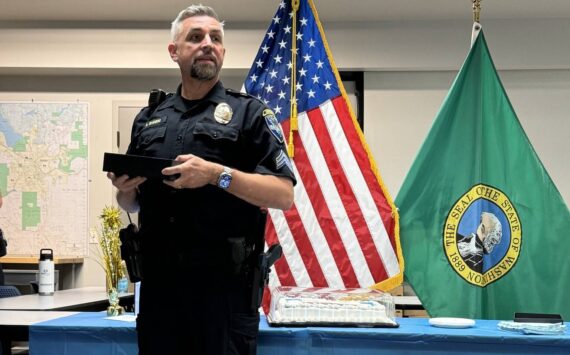 Sgt. Roger Enders and colleagues celebrate his last day on the job on May 31. (Photo courtesy of Issaquah Police Department Facebook)
