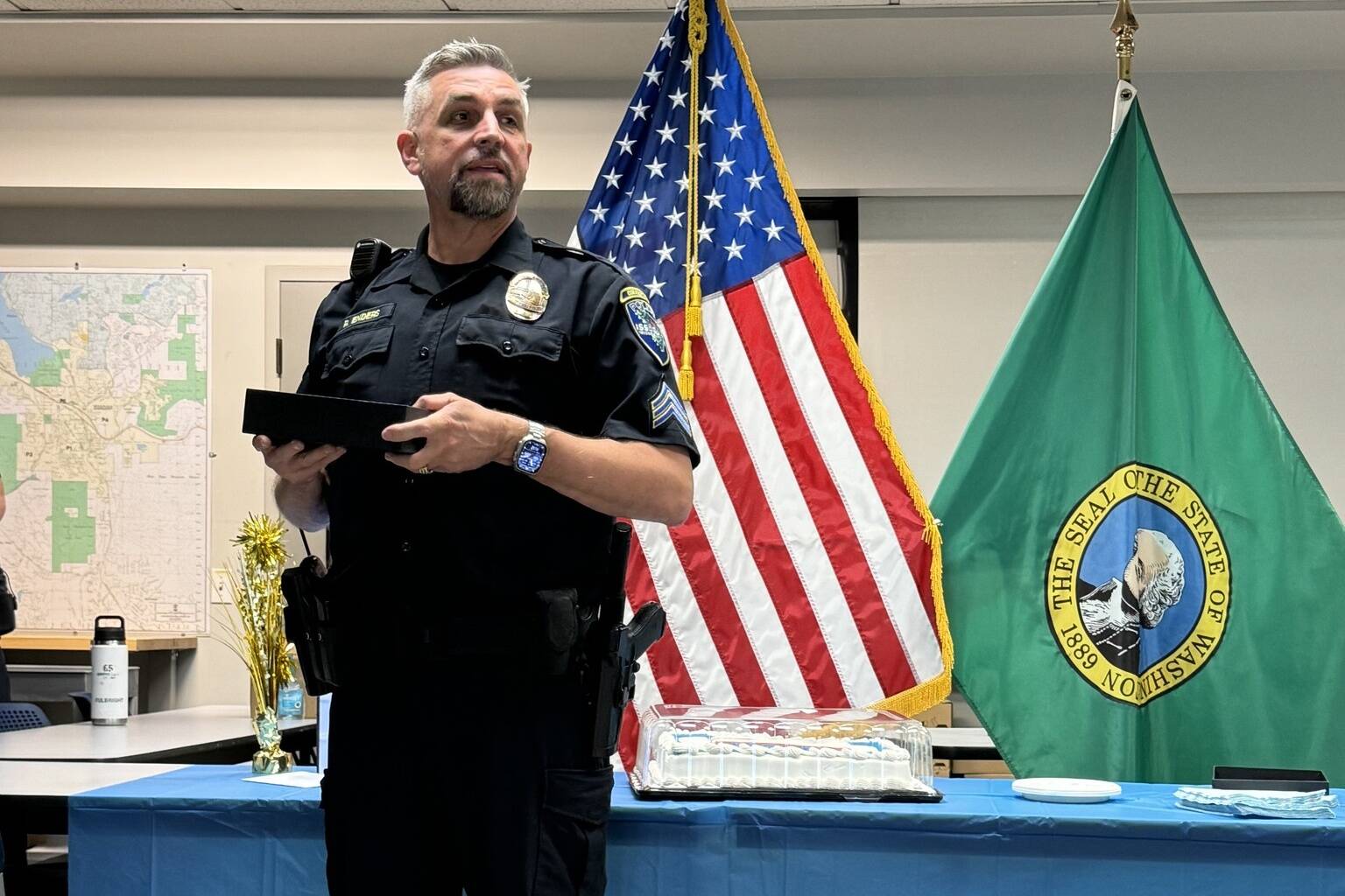 Sgt. Roger Enders and colleagues celebrate his last day on the job on May 31. (Photo courtesy of Issaquah Police Department Facebook)