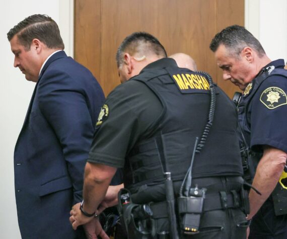 Auburn Police Officer Jeffrey Nelson is escorted out of the courtroom following the guilty verdict at his murder trial June 27, 2024. (Ken Lambert / The Seattle Times / Pool)